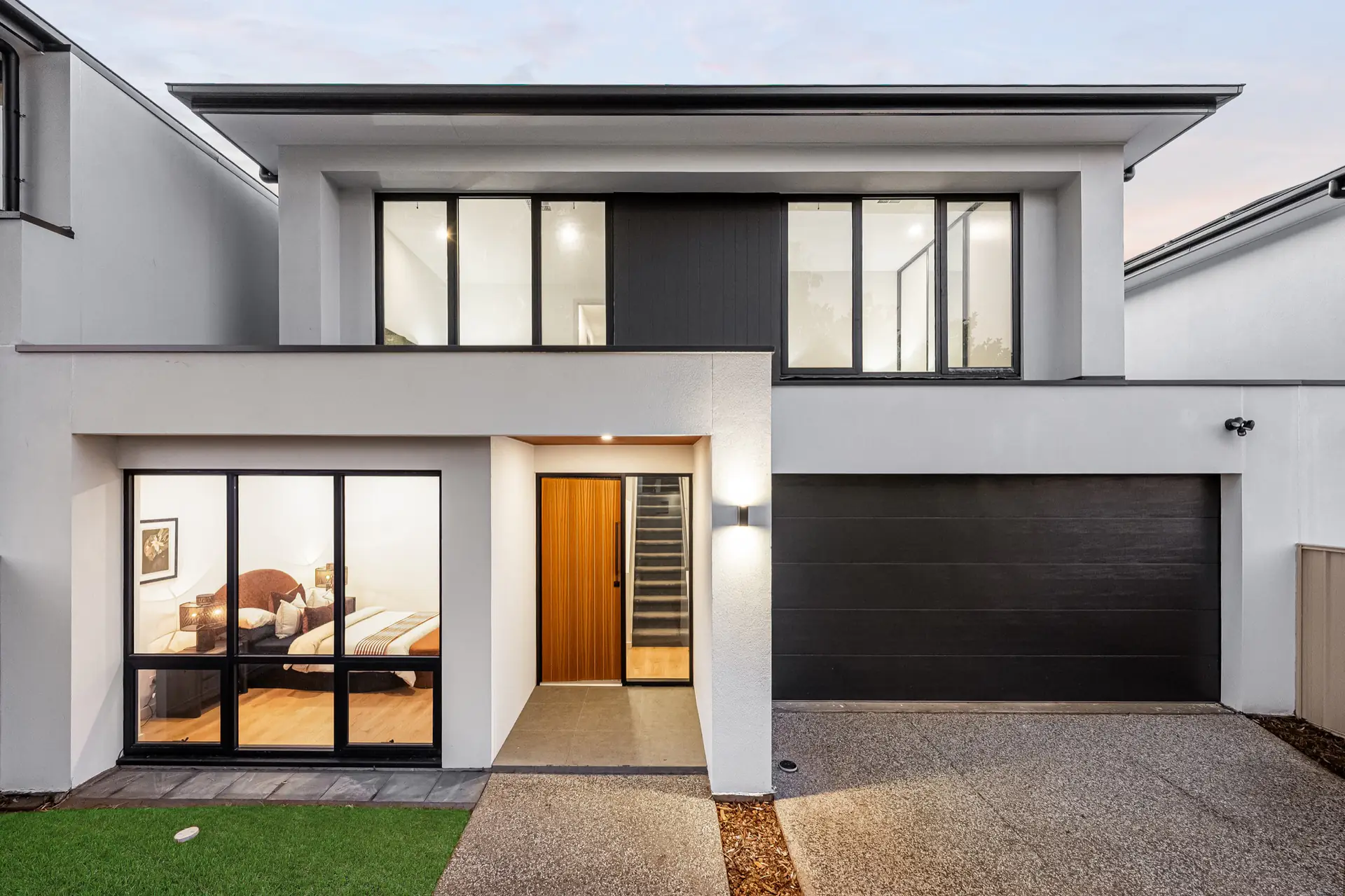 Rear elevation and covered outdoor dining area.