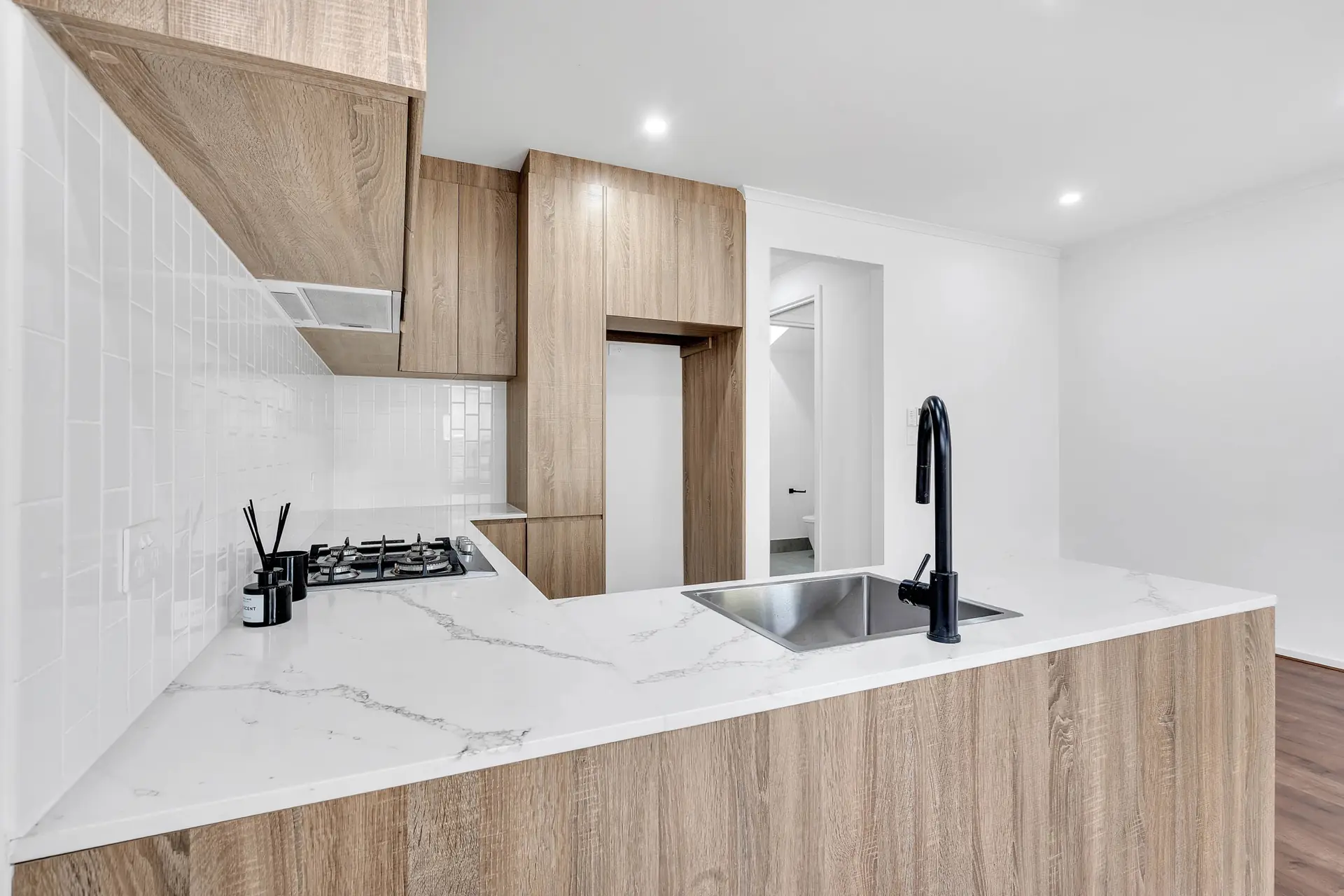 Kitchen island and black tapware at St Bernards Road Rostrevor.