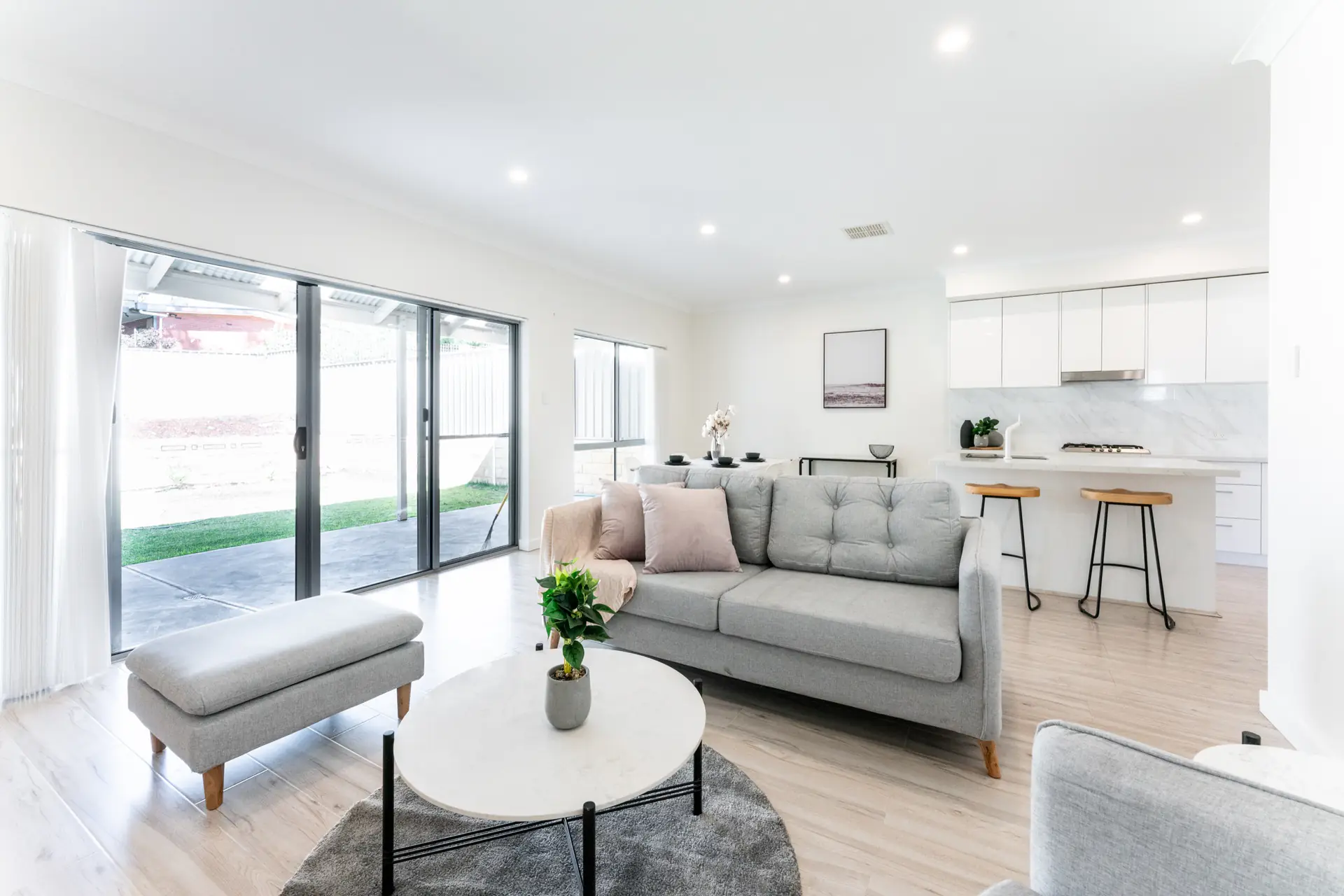 Open-plan living and kitchen at Strathcona Avenue Clapham opening toward the rear yard.